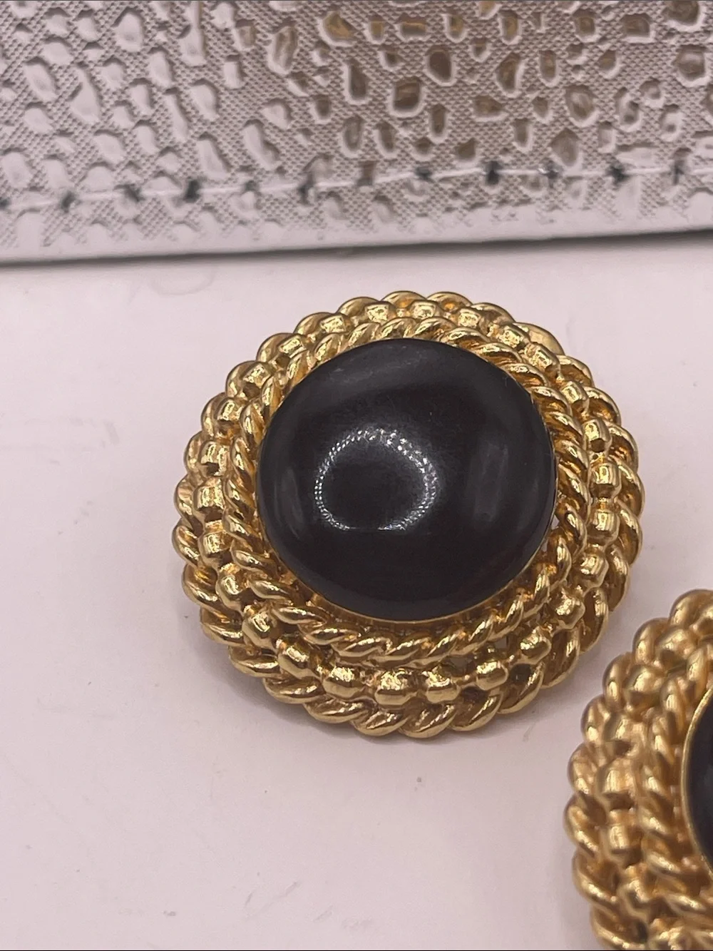 07.08.26-4 Vintage St. John Goldtone Rope Trim Earrings with Faux Onyx Centers